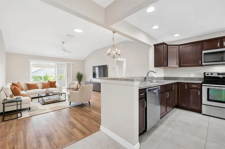 Kitchen with Living and Dining Rooms - Virtually Staged