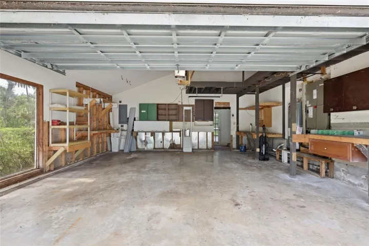 Large Garage with tons of storage above and pull down access