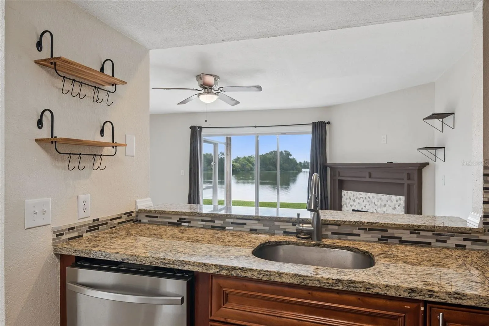 Kitchen with Granite Countertops and new Stainless Steel Appliances