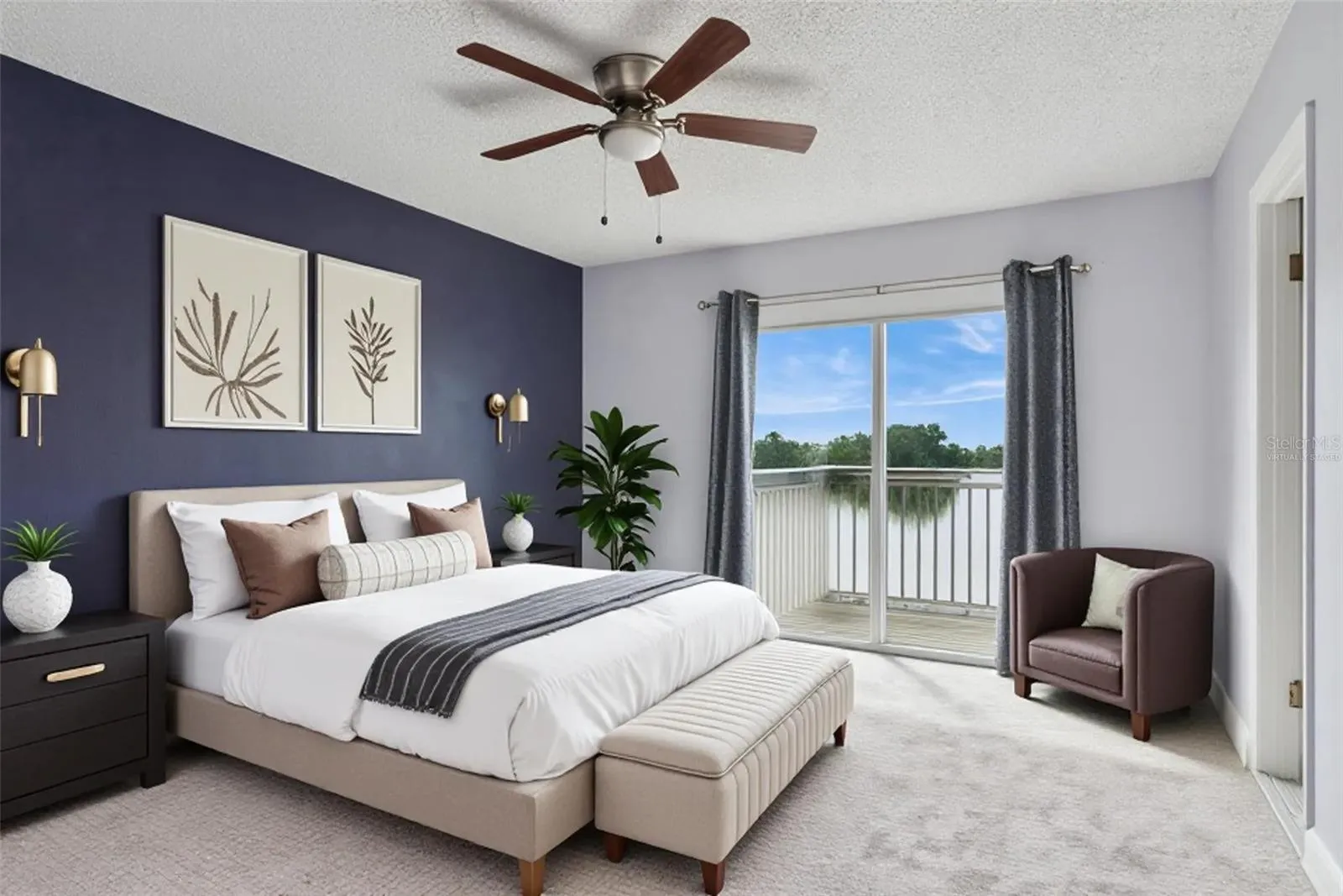 Virtually Staged Primary Bedroom with view to the Balcony that overlooks the pond