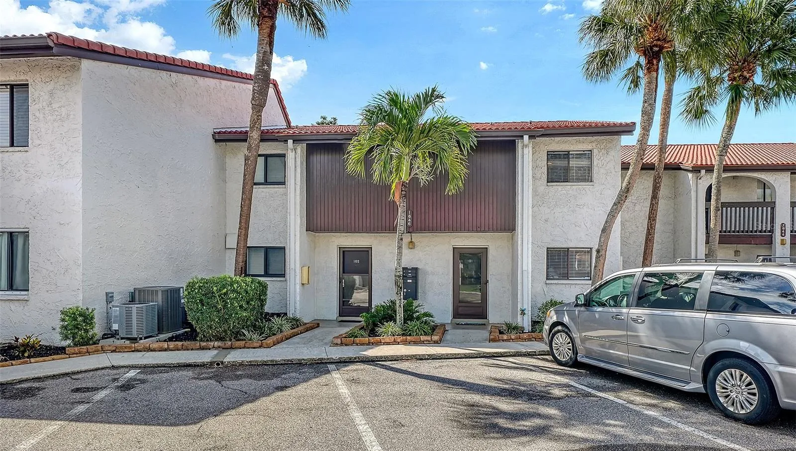Building #1646, Unit #101 front door on the right. Deeded and assigned parking space number 163 right in front.