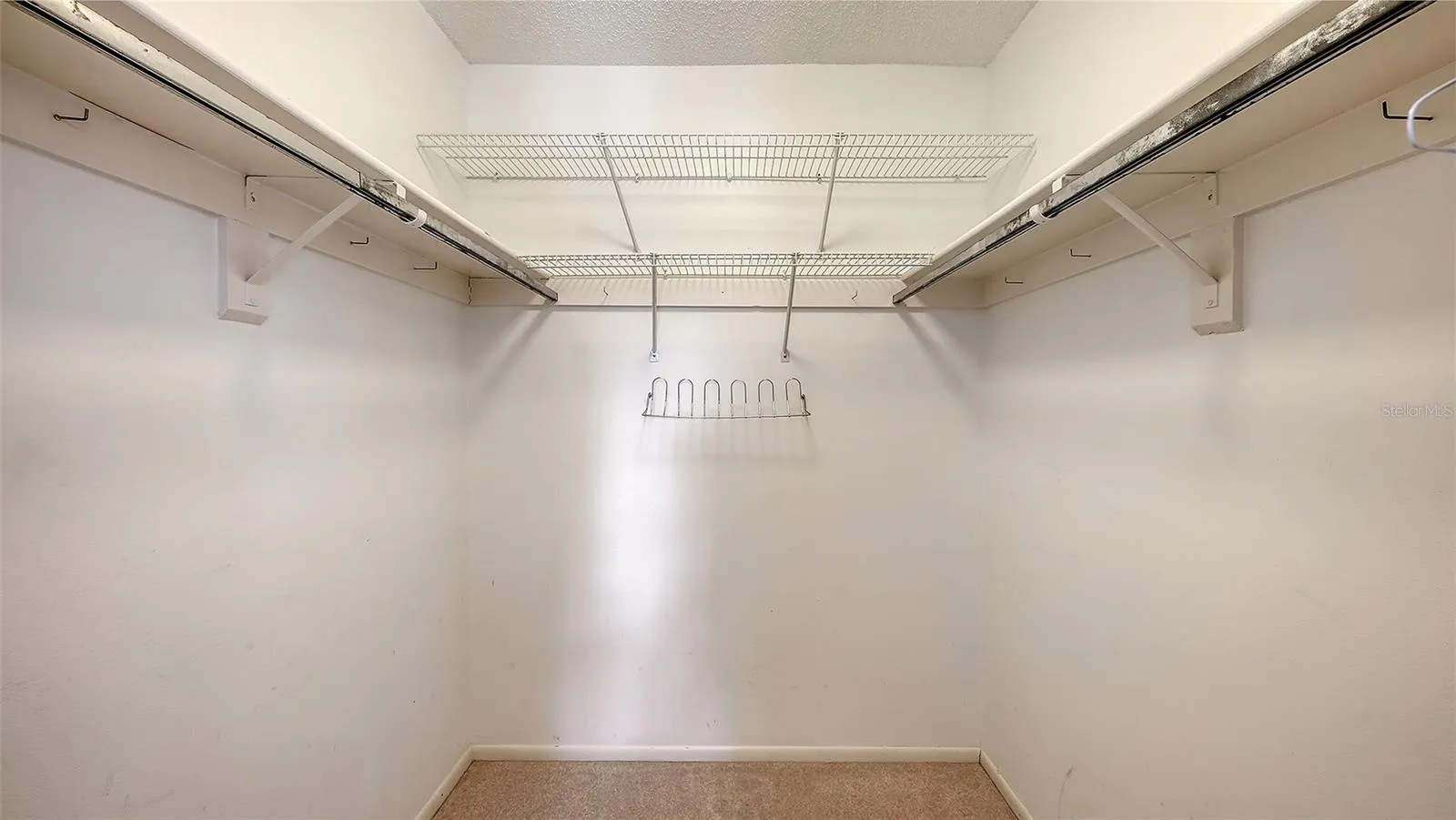 Primary Bedroom, second floor walk-in Closet.