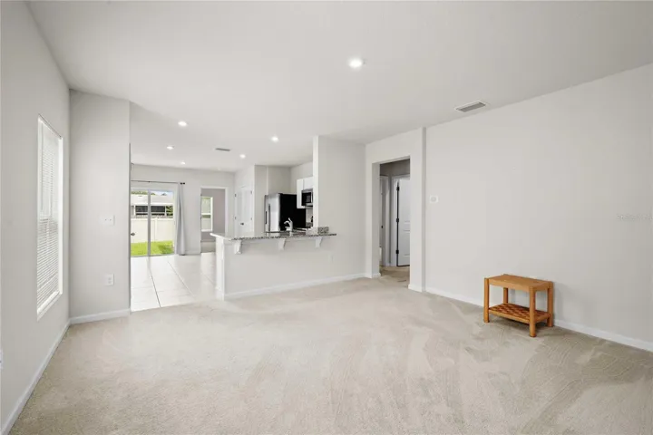 The living room is just off the kitchen