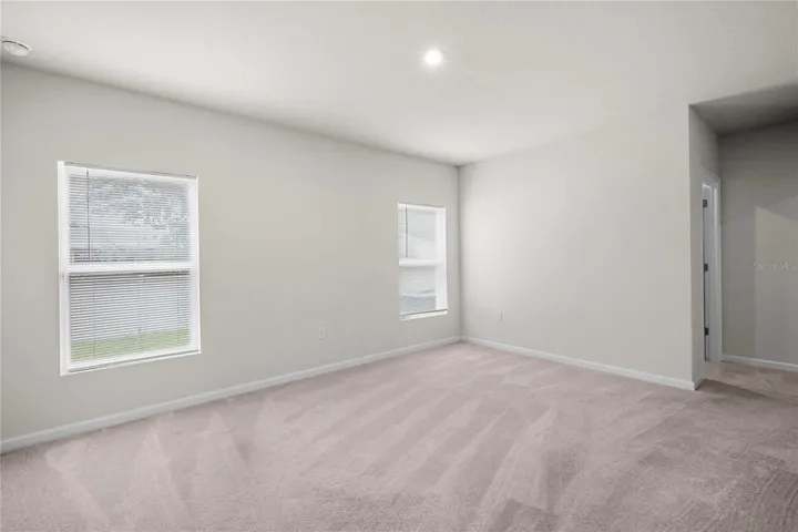 The primary has a walk in closet and ensuite bath