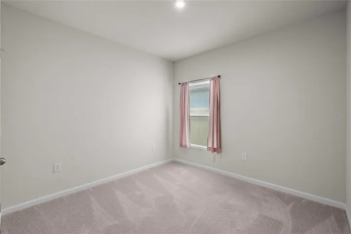 Both bedrooms are split away from the primary bedroom offering privacy
