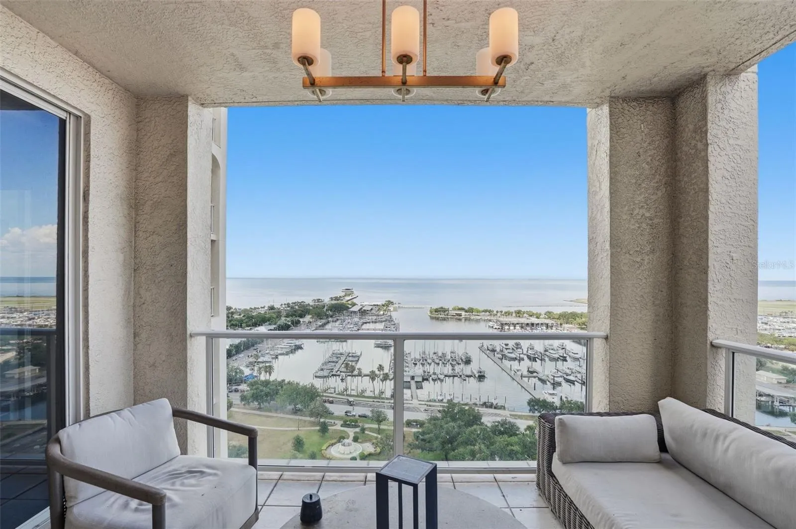 Enjoy the view of Tampa Bay, the Marina and South Straub Park from one of four balconies here at residence 1900 in The Florencia condominium