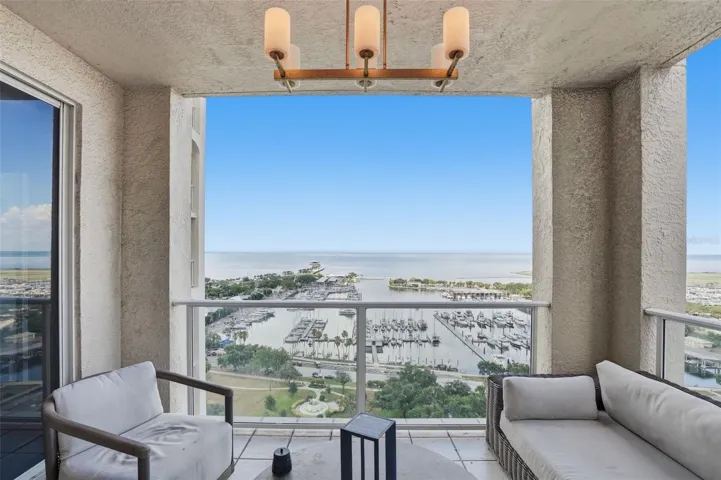 Enjoy the view of Tampa Bay, the Marina and South Straub Park from one of four balconies here at residence 1900 in The Florencia condominium