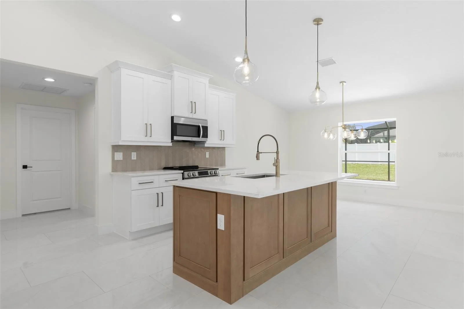 Island wrapped with cabinetry