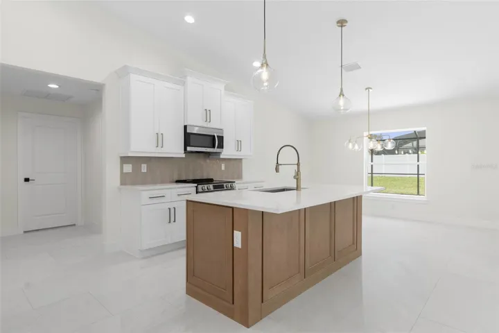 Island wrapped with cabinetry