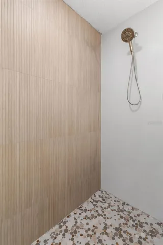 Custom shower details including Delta Arvo Two-in-One Shower System