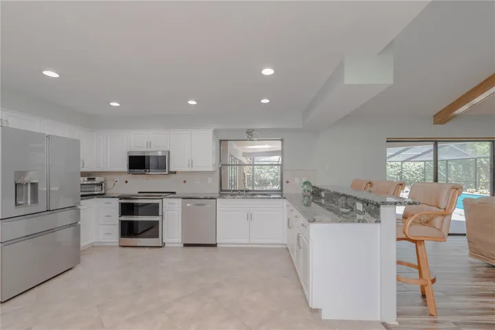 Kitchen with stainless steel appliances.