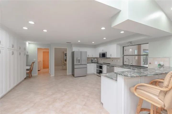 Kitchen with abundant cabinetry.
