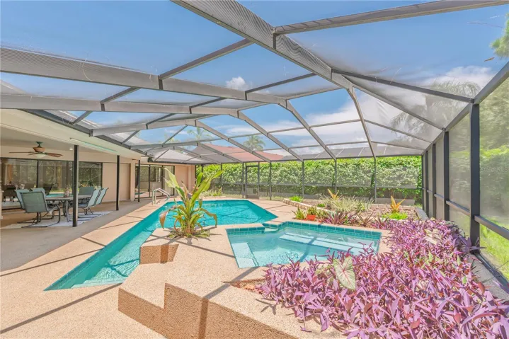 Heated spa spills over into pool.