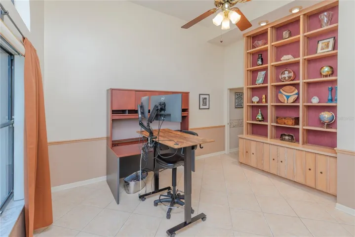 Executive office with built-in shelves.