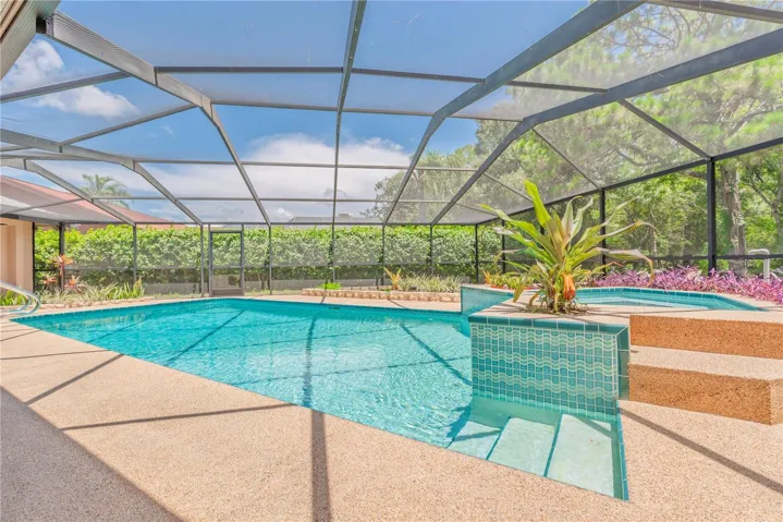 Pool with spillover spa.