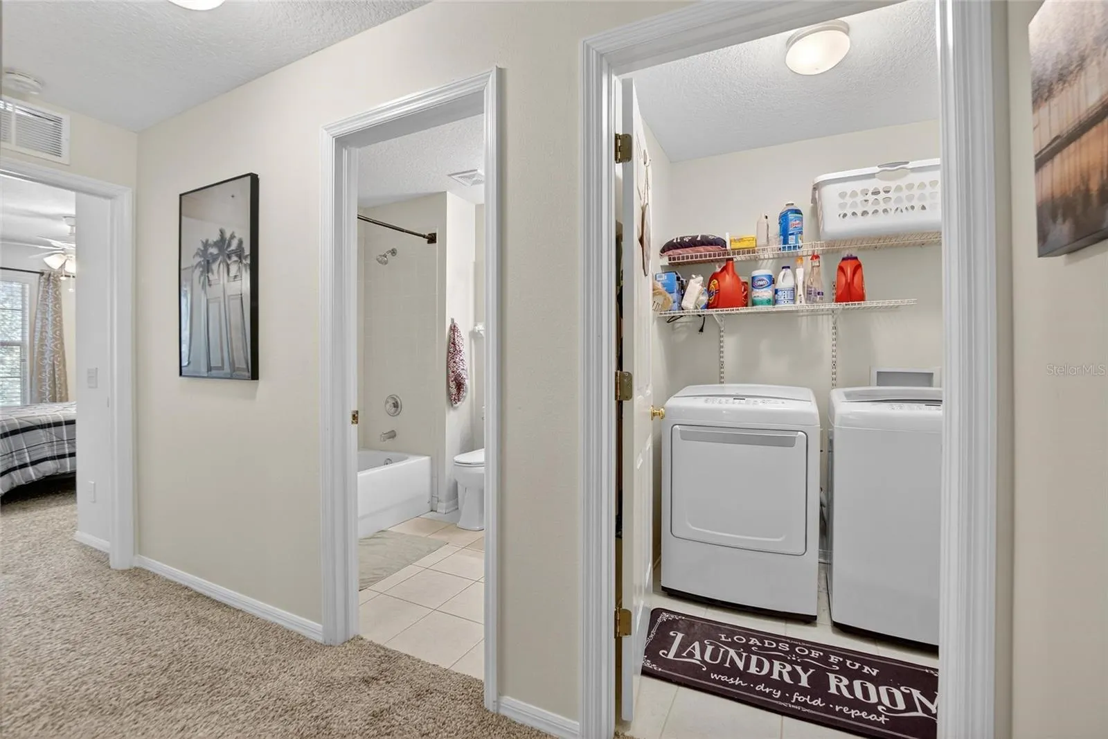 Washer & Dryer with View of Bathroom 1 - Upstairs