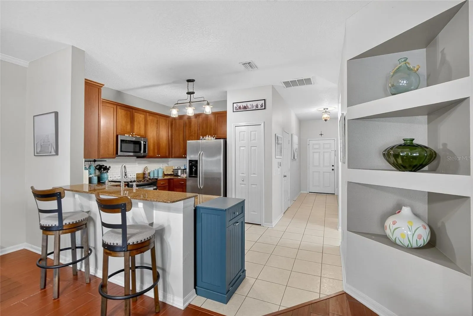 Bartop View into Kitchen and Entryway