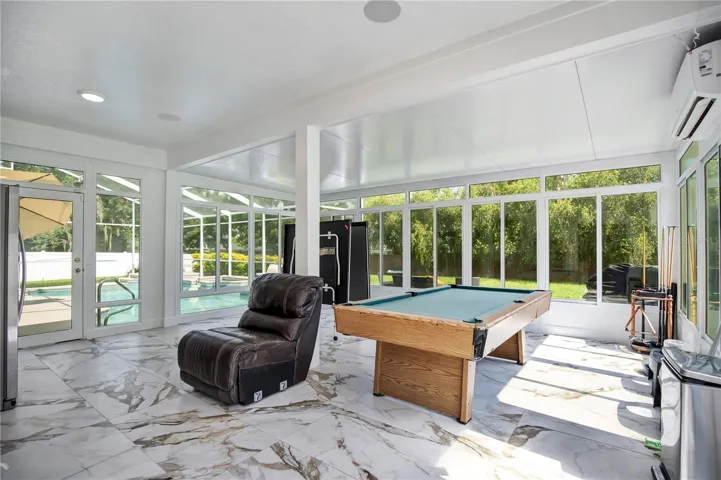 air conditioned florida room/game room