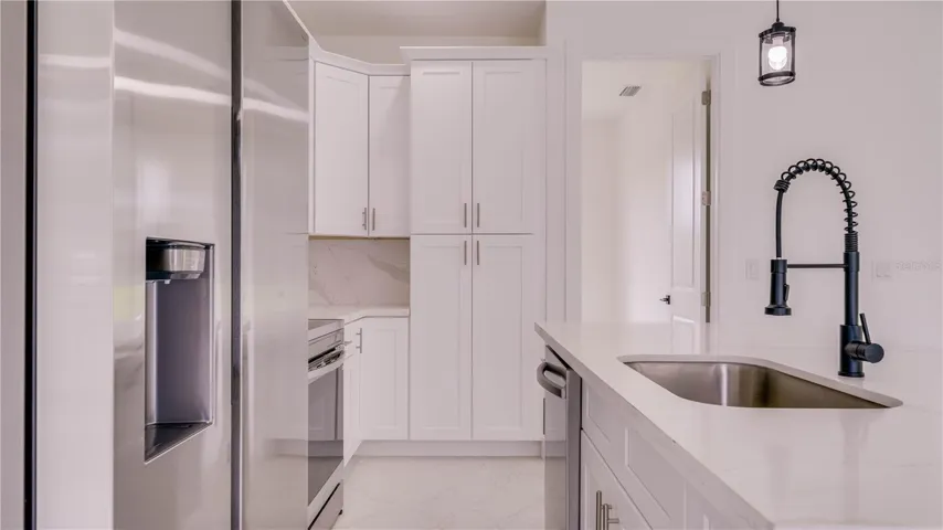 High end Samsung Stainless Steel appliances. Built in Pantry!