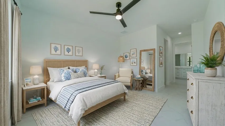 Primary bedroom with 2 walk-in closets and en-suite. (Virtually staged)