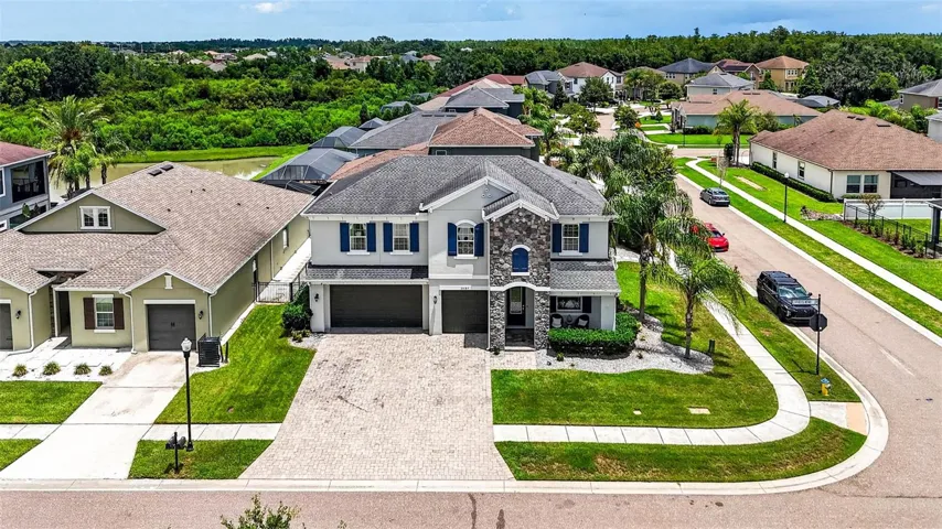This stunning corner lot has the best of living to offer!