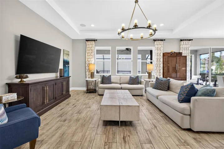 Living room with overhead lighting & stunning daylight.