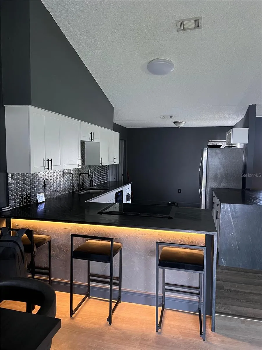 Kitchen view w/lighting turned on 3