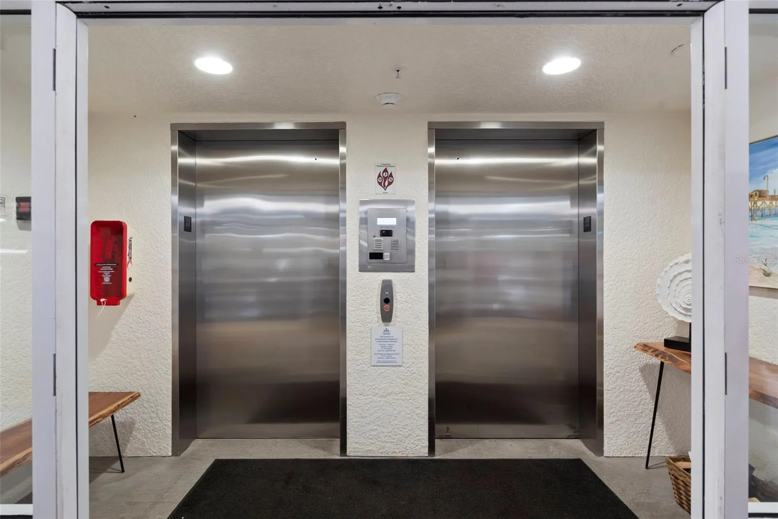 Elevator/Lobby security coded, locked stairs avail on each side of building as well