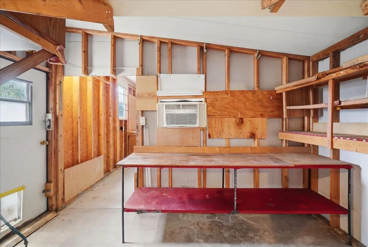 workshop area w/ wall unit air contioning