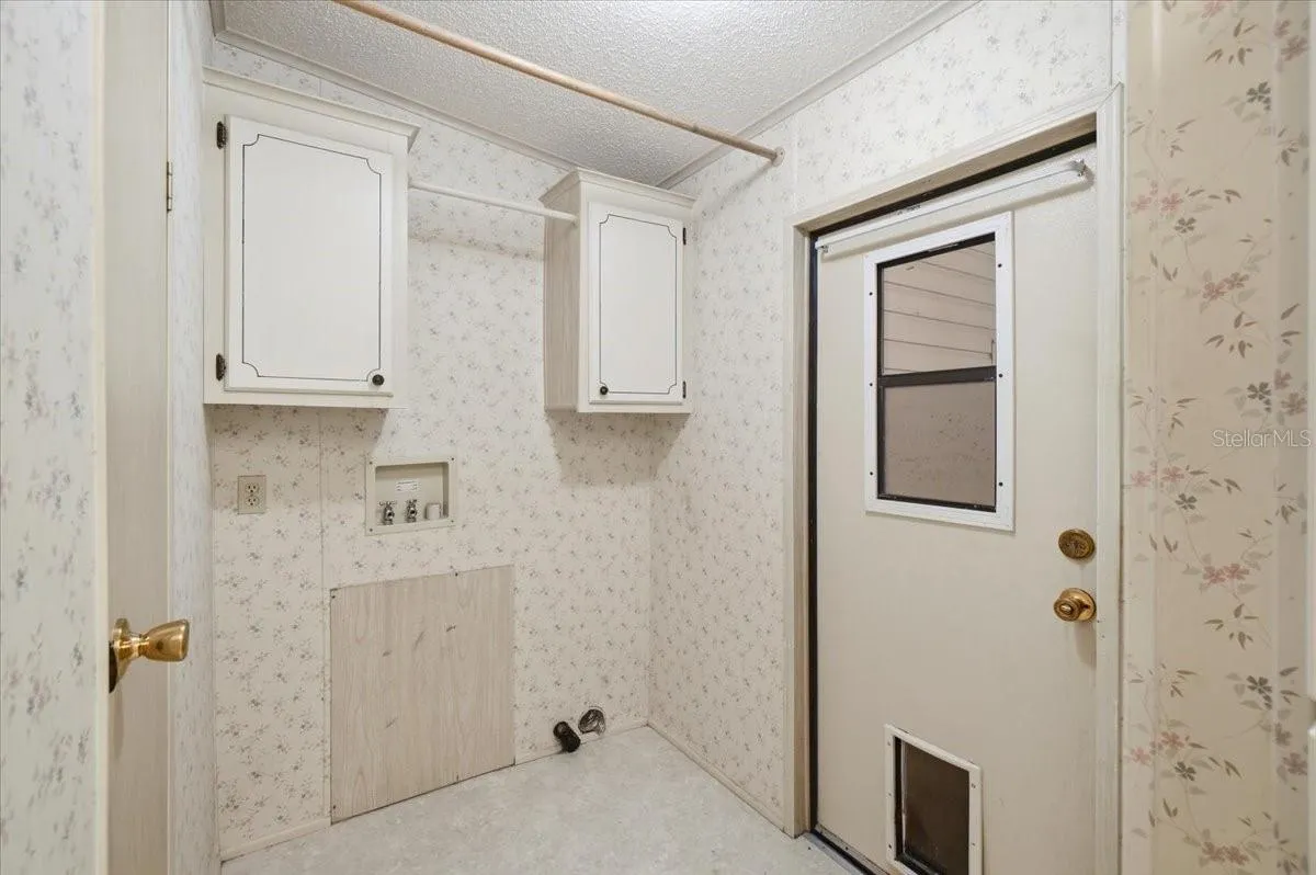 Laundry room located conveniently off kitchen