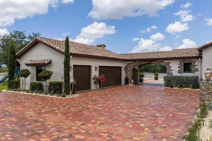 3 car garage and Porte cochere
