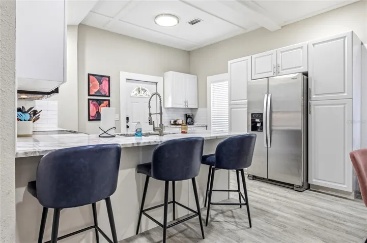 Kitchen has Granite Breakfast Bar!