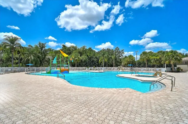 POOL W/ WATER FEATURES AND SLIDE