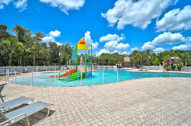 POOL W/ WATER FEATURES AND SLIDE