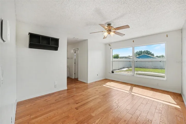 Master bedroom with oversized windows