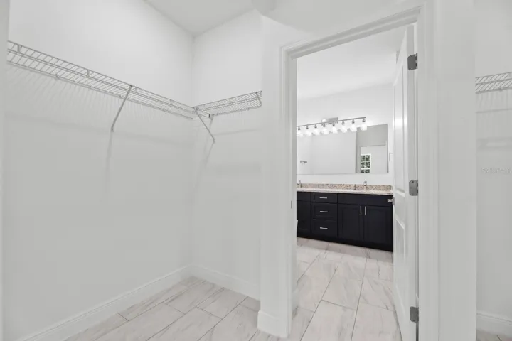 MASTER CLOISET 2 OF 2 AND DOOR TO BATHROOM