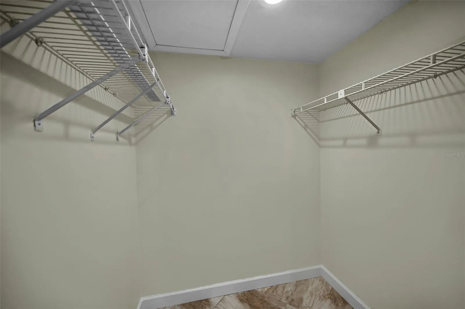 Primary bedroom large walk in closet