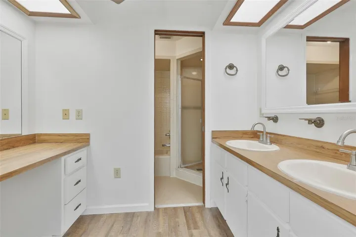 Double vanity and dressing table is perfect for multiple users at the same time, with the shower, tub and toilet separate.