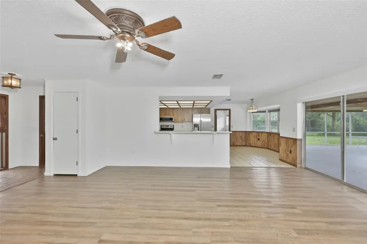 Open to the kitchen and dinette area, you are always part of the action.