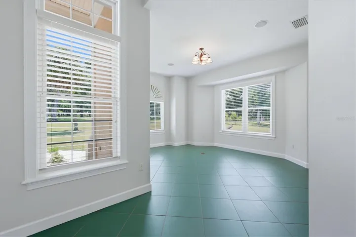 Private guest bedroom with large windows