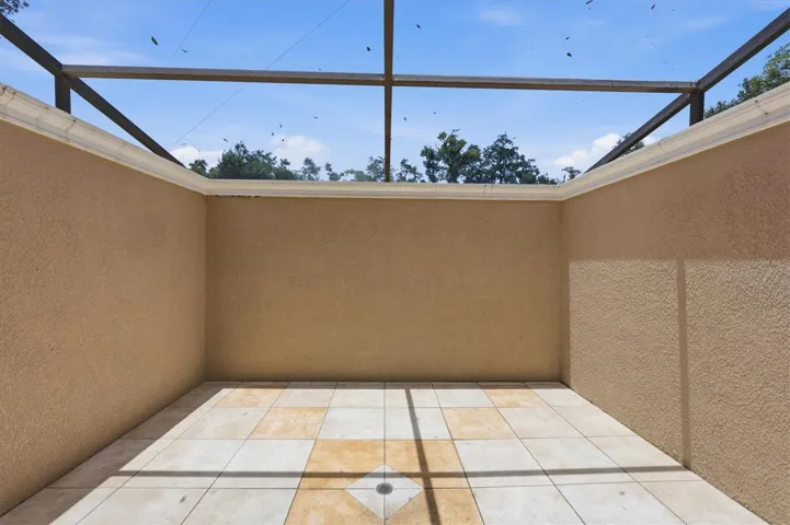 Private screened courtyard with open-air design