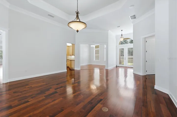Spacious open living area with hardwood flooring