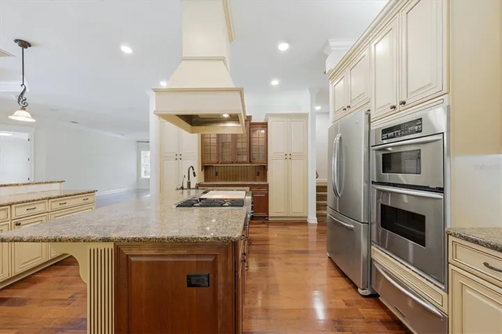 Chef’s kitchen with built-in stainless-steel appliances