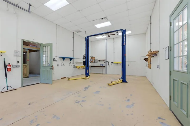 Automotive workshop with professional vehicle lift