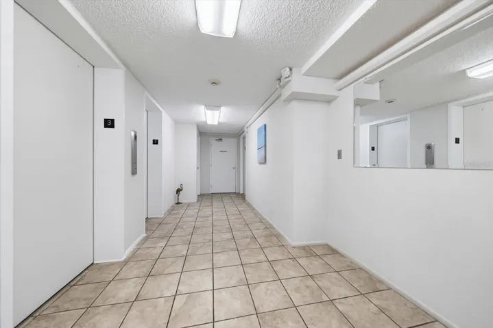Hallway to Elevators & Laundry Room