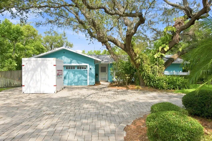 Front of House w/ Circular Pavered Driveway