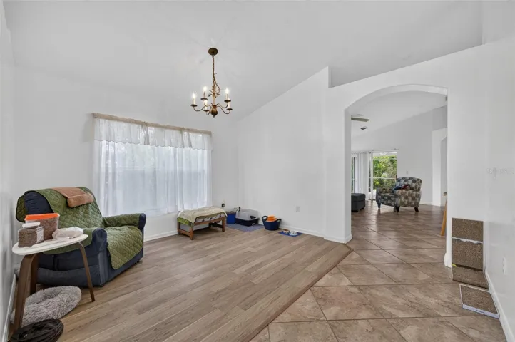 View of living room from entrance and front office