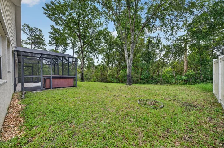 Large, private backyard with tranquil wooded views