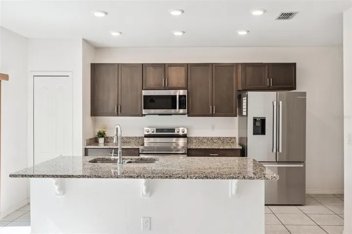 Beautiful kitchen with granite countertops and stainless steel appliances