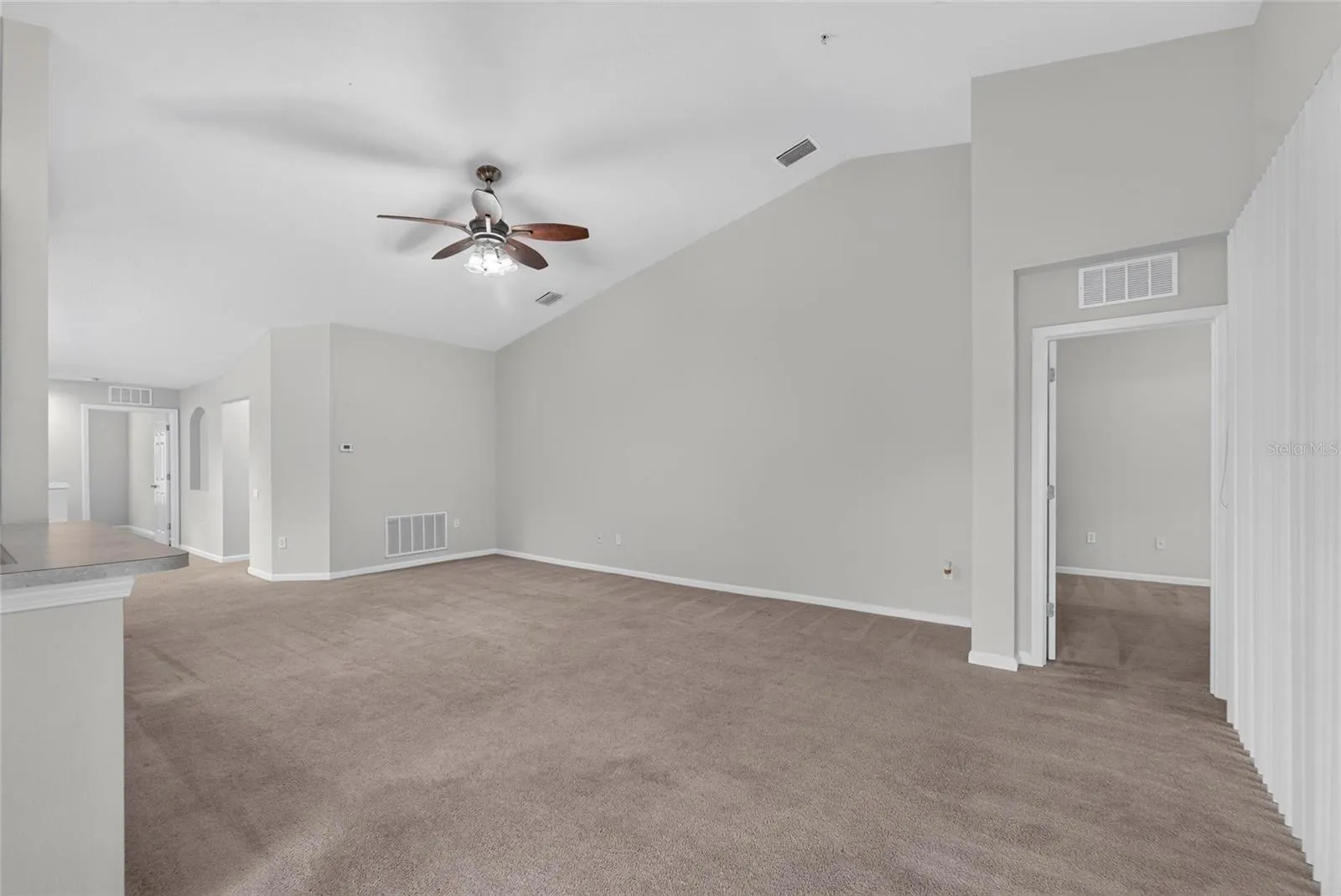 Livingroom with open floor plan to Dinette, Kitchen, and Dining room
